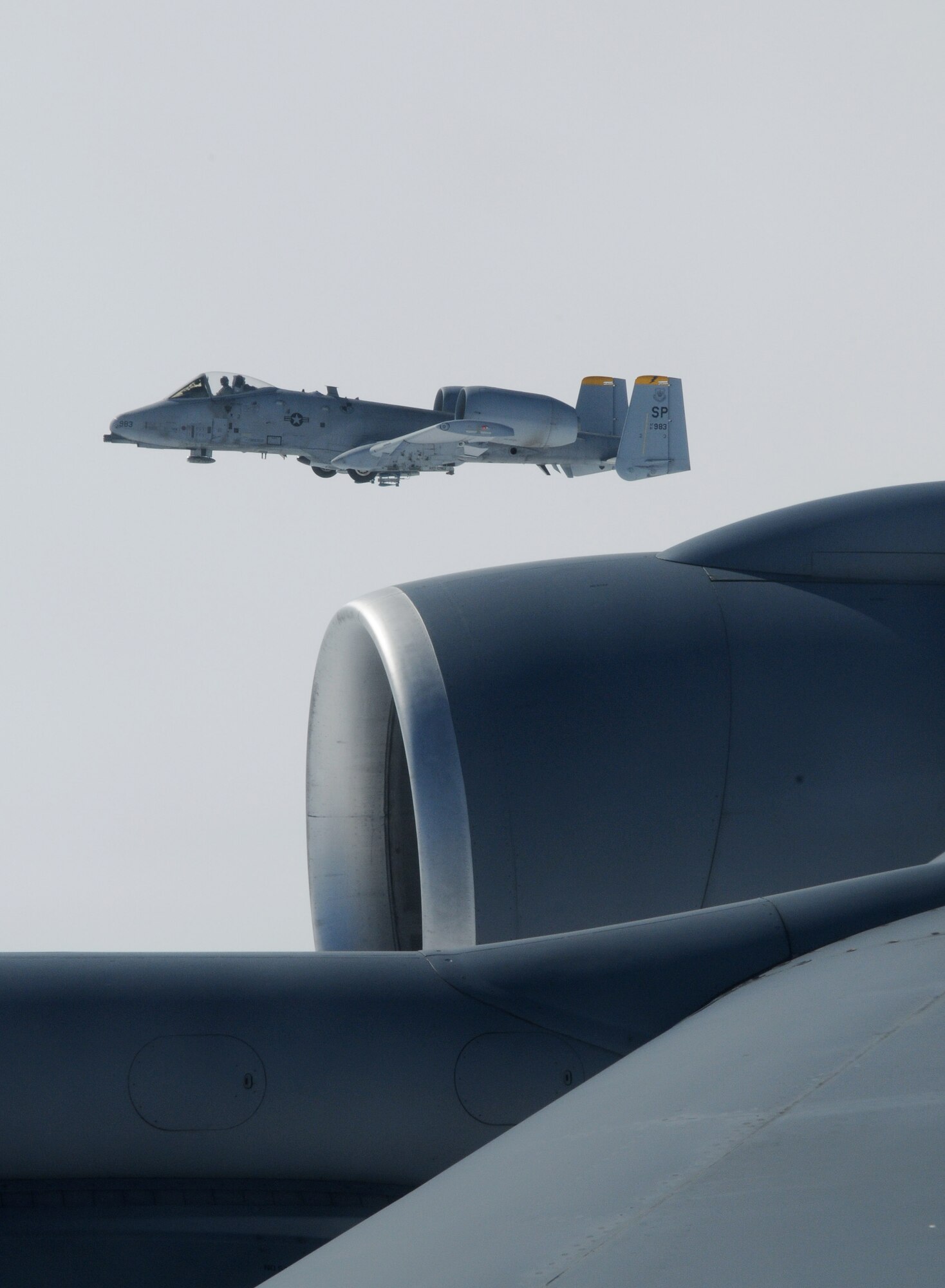 SWEDISH AIR SPACE -- A 52nd Fighter Wing A-10 Thunderbolt II from Spangdahlem Air Base, Germany, flies off the wing of a 100th Air Refueling Wing KC-135 Stratotanker from RAF Mildenhall, England, during Baltic Region Training Event XII, a multinational NATO exercise, May 30, 2012. BRTE XII included support from several countries including the United States, France, Estonia and Latvia. (U.S. Air Force photo/Staff Sgt. Thomas Trower)