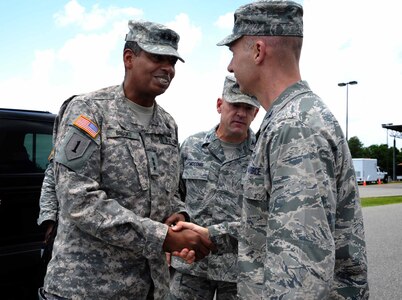 Army Lt. Gen. Vincent Brooks, Third Army commanding general, is greeted by Col. Justin Davey (right), 628thk Mission Support Group commander, and Col. Richard McComb (center), Joint Base Charleston commander, at the JB Charleston – Weapons Station May 23, 2012. Brooks visited JB Charleston to get a first-hand look at the military functions that are unique to this base. (U.S. Air Force photo/Airman 1st Class Ashlee Galloway)