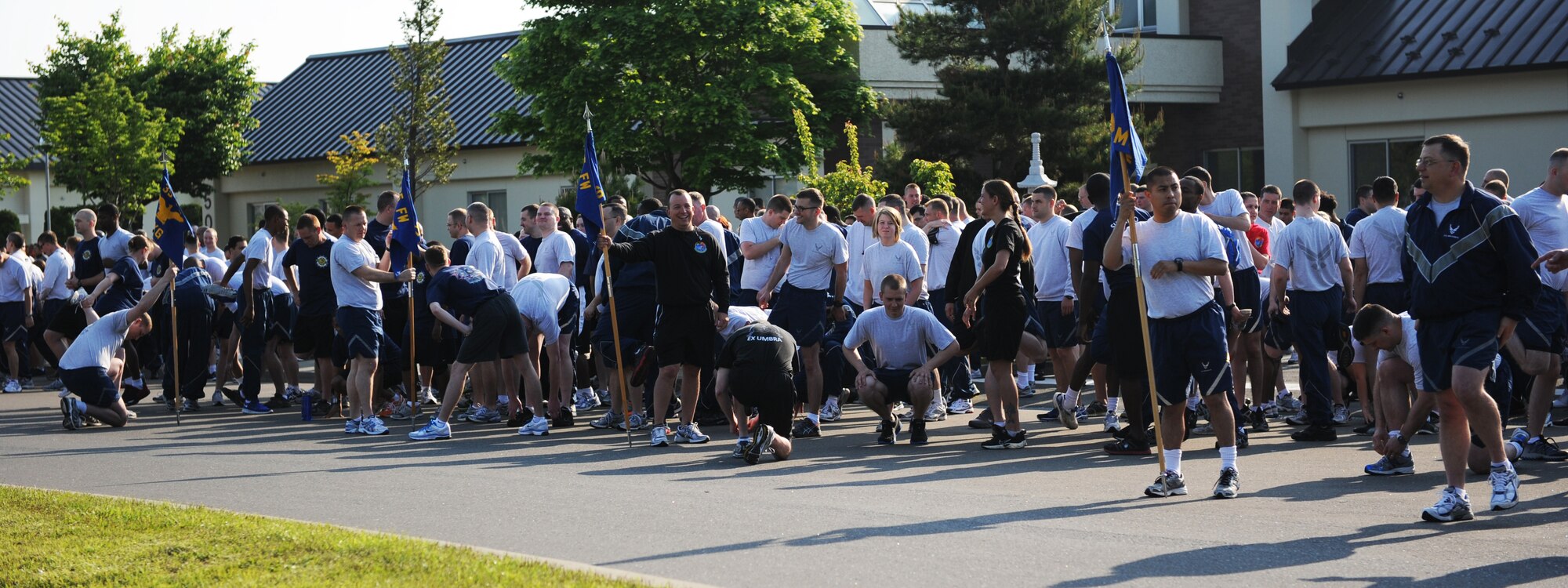Members of Misawa Air Base warm-up before participating in the first readiness run of the year at Misawa Air Base, Japan, June 1, 2012. Warming up before a run helps prevent and reduce the risk of injury. (U.S. Air Force photo by Airman 1st Class Kia Atkins/Released)