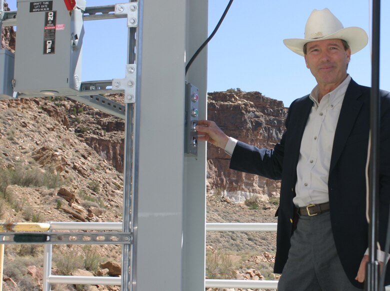 Sen. Tom Udall pushed the button making the low-flow turbine at Abiquiu operational at a ceremony April 21.