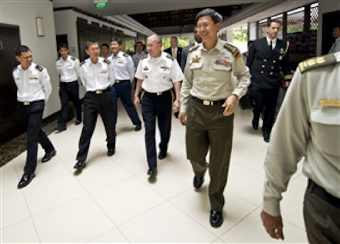 U.S. Army Gen. Martin E. Dempsey, chairman of the Joint Chiefs of Staff, and his Singapore counterpart Lt. Gen. Neo Kian Hong talk at Sembawang Air Base  in Singapore, June 1, 2012.