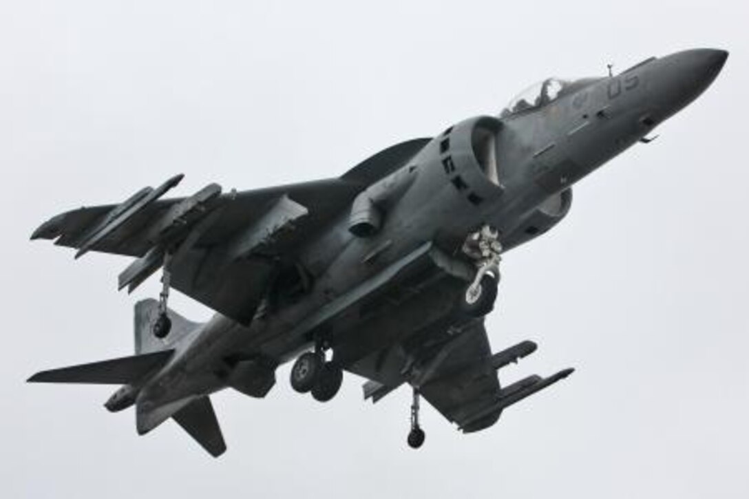 An AV-8B Harrier lands on the flight deck of the USS Peleliu during daily flight operations as part of PHIBRON Three and 15th MEU’s PHIBRON-MEU Interoperability Training off the coast of southern California, June 1. The purpose of the exercise is to give Marines and sailors the opportunity to become familiar working together as a blue-green team, a must when it comes to flight deck operations.