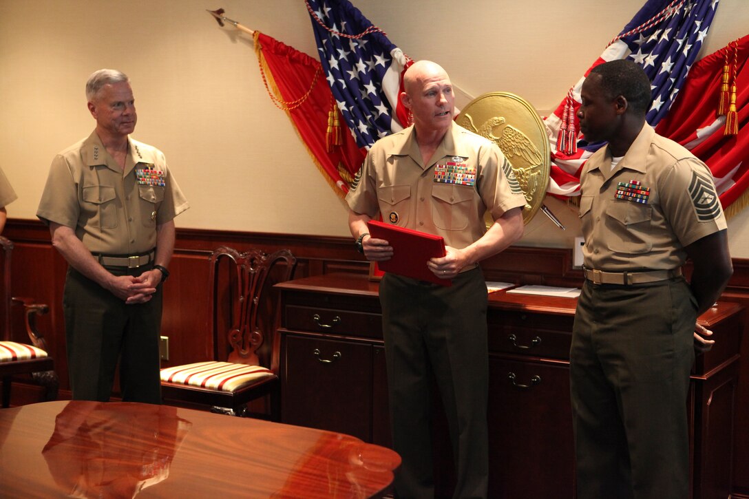 Petty Officer 3rd Class, Norberto Zamora, a hospital corpsman with 2nd Battalion, 5th Marines, Regimental Combat Team 6, assess a new compound during Operation Jaws, July 1, 2012. Zamora carries enough medical supplies to sustain the Marines anytime they leave their base.