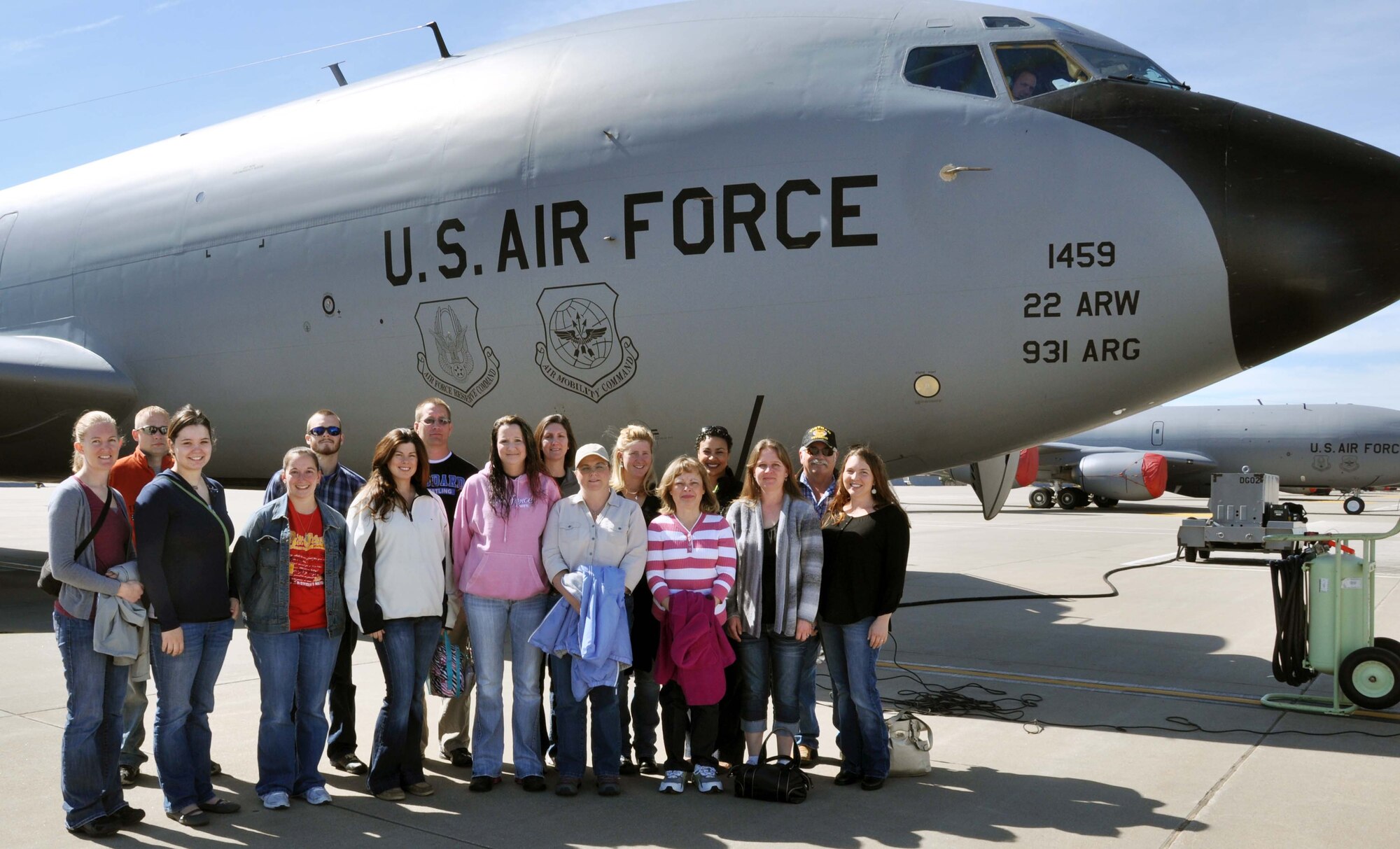 Spouses of 931st Air Refueling Group members prepare to board a KC-135 Stratotanker for a spouse orientation flight, June 2, 2012.  Sixteen spouses of Group members participated in the flight.  During the flight, the spouses were able to observe the air refueling of an E-3 Sentry airborne warning and control system (AWACS) aircraft.  Spouse flights are conducted to provide spouses with a greater understanding of the 931st Air Refueling Group mission and help to promote rentention of Air Force Reserve members.  (U.S. Air Force photo by 1st Lt. Zach Anderson)