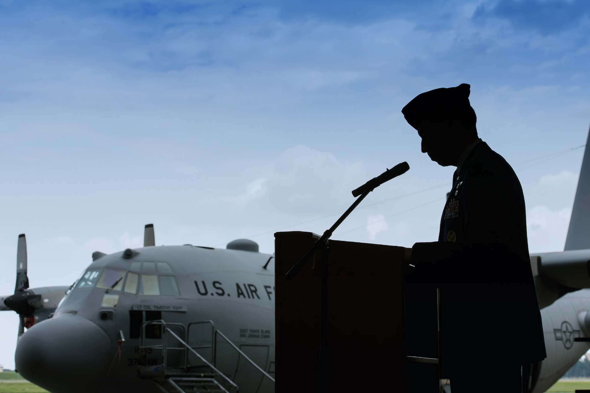 YOKOTA AIR BASE, Japan -- Lt. Col. Jeffrey Menasco, 36th Airlift Squadron commander, gives a speech during the 36th AS change of command ceremony at Yokota Air Base, Japan, on June 1, 2012. Menasco was the Director of Staff for the 374th Airlift Wing, Yokota AB. (U.S. Air Force photo by Osakabe Yasuo)