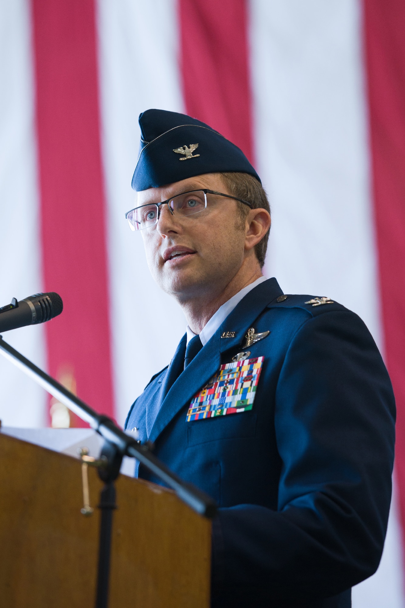 YOKOTA AIR BASE, Japan -- Col. David Gould II, 374th Operations Group commander, gives a speech during the 36th Airlift Squadron change of command ceremony at Yokota Air Base, Japan, on June 1, 2012. The change of command is a traditional military ceremony in which the departing commander assembles his troops for presentation to the incoming commander. (U.S. Air Force photo by Osakabe Yasuo)