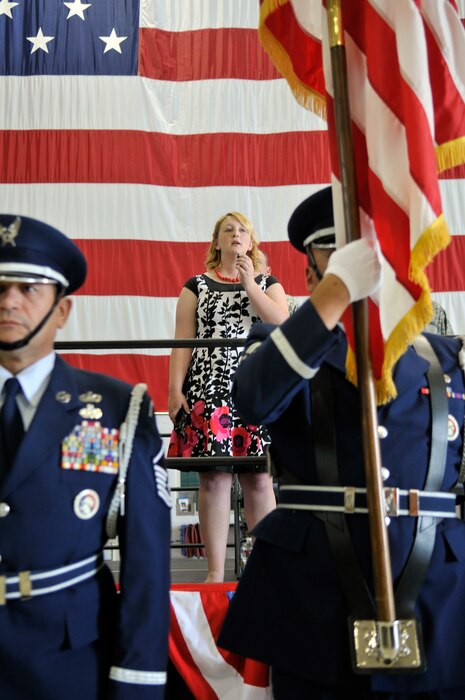 Rachel Hoferitza sings the national anthem at the opening ceremony of the 151st Air Refueling Wing's 2012 Airman Appreciation Day at the Utah Air National Guard base in Salt Lake City, June 2 2012.  (U.S. Air Force Photo by Tech. Sgt. Jeremy Giacoletto-Stegall/Released)