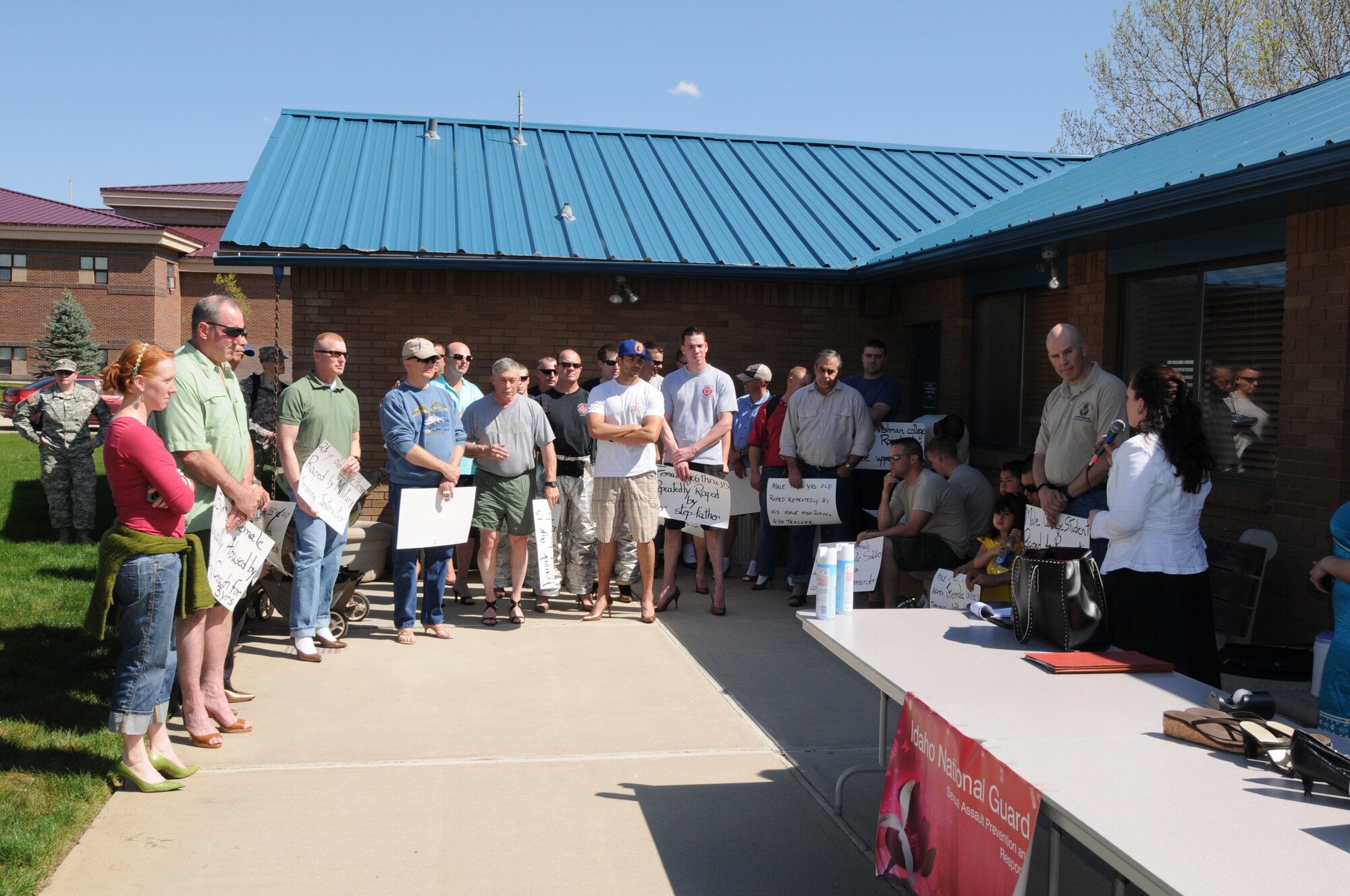 Members of the Idaho Army and Air National Guard gather for the Walk a Mile in Her Shoes event April 20 at Gowen Field, Boise, Idaho. The event was held in recognition of Sexual Assault Awareness month.