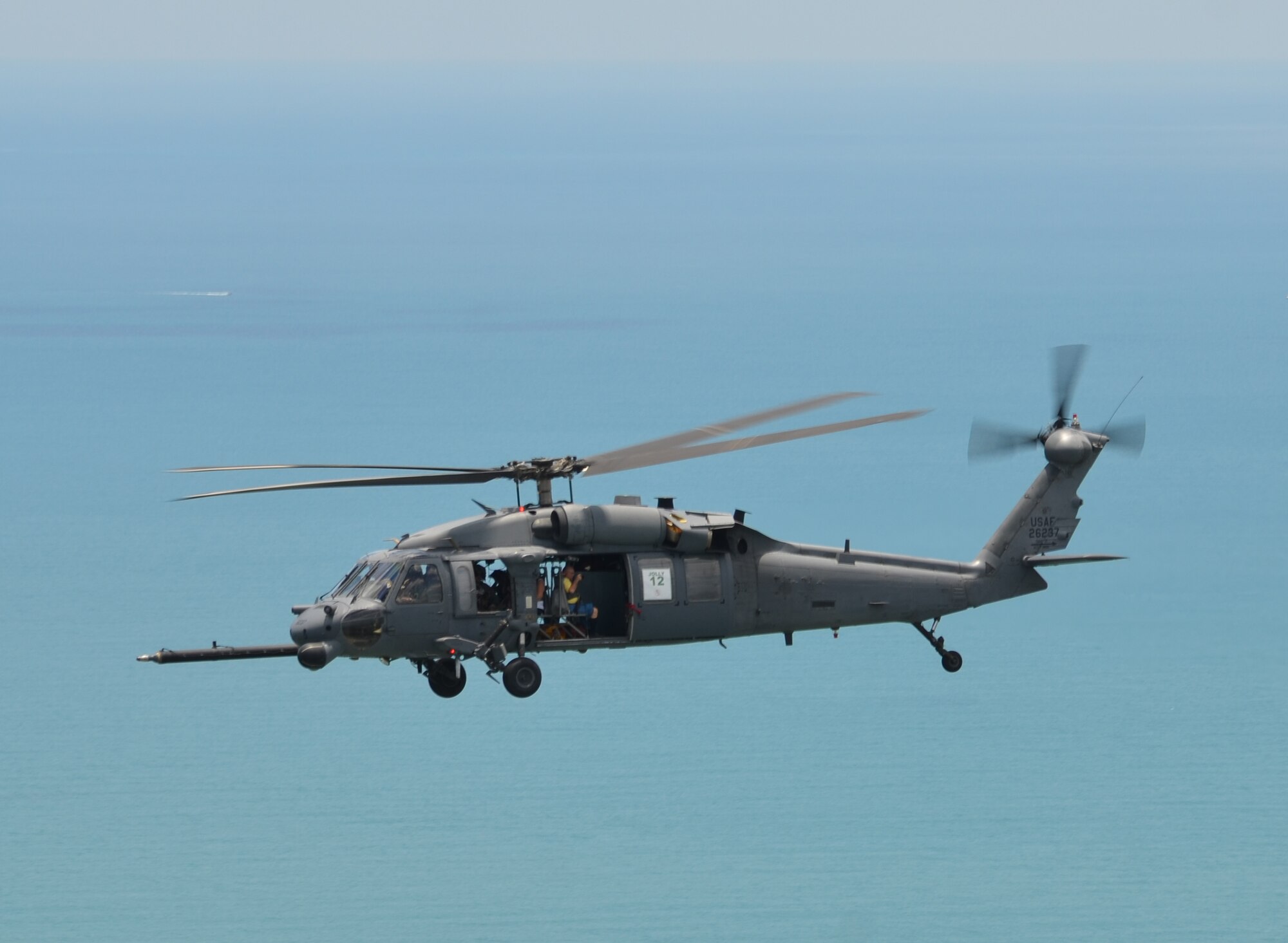 Reserve Airmen from the 920th Rescue Wing fly spouses and employers of Reservists on an HH-60 Pave Hawk helicopter over Florida’s Atlantic Coast. The flight was part of Family Day at Patrick Air Force Base, Fla. (U.S. Air Force photo/Staff Sgt. Anna-Marie Wyant)