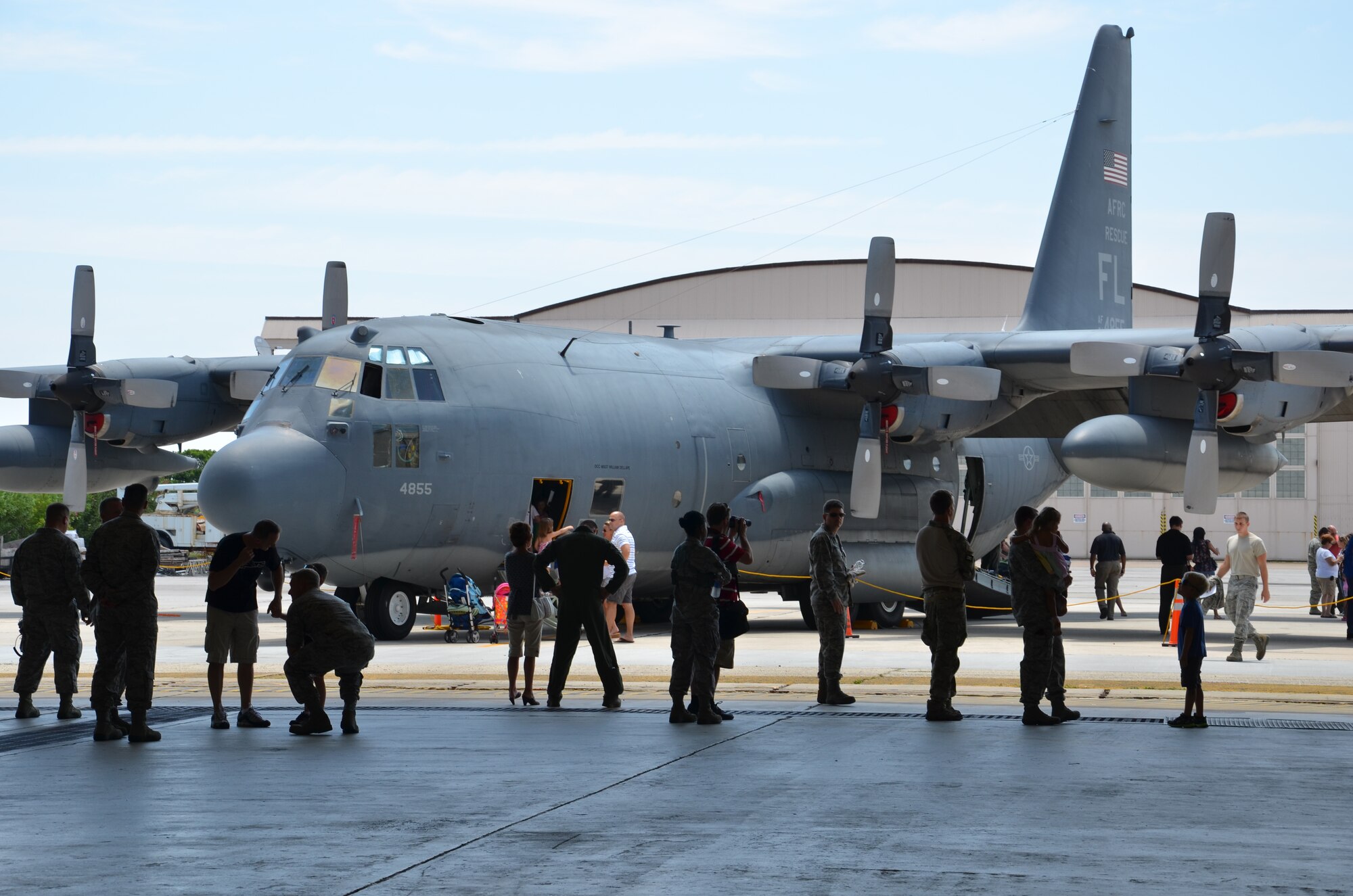 Reservists, family members and employers view a static display of a WC-130 Hercules aircraft at Patrick Air Force Base, Fla., June 2, 2012 during the 920th Rescue Wing’s Family Day. (U.S. Air Force photo/Staff Sgt. Anna-Marie Wyant) 