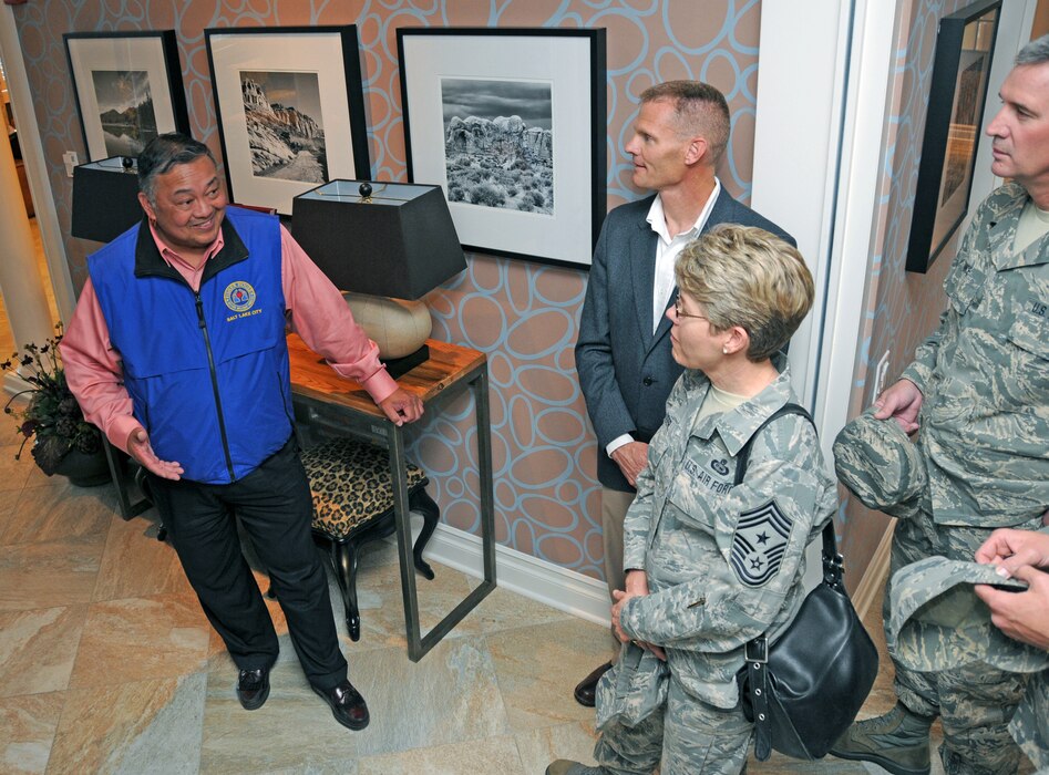 U.S. Marine Corps Colonel (ret) Ray Bachillar provides a tour of the Fisher House in Salt Lake City, Utah, to members of the Utah Air Guard Chief's Council on May 4, 2012. The Fisher House provides housing for family members of veterans receiving health care at the nearby Veterans Administration hospital.(U.S. Air Force photo by Master Sergeant Gary J. Rihn) 