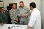 U.S. Army, Major General Brian Tarbet, The Adjutant General for the Utah National Guard, talks to an ear specialist at a clinic near Agadir, Morocco, on April 15, 2012. (U.S. Air Force photo by Master Sergeant Gary J. Rihn/Released)