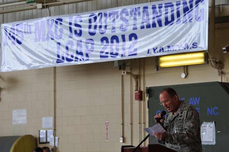 Charlotte, N.C. -- Col David Zartman, outgoing commander of the 145th Maintenance Group, thanks his Airmen for their constant hard work June 2, 2012. (U.S. Air Force photo by Tech. Sgt. Brian E. Christiansen)