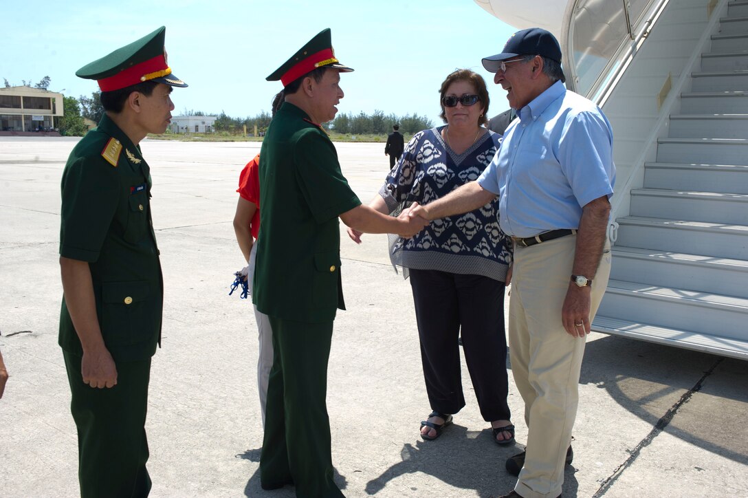 Vietnamese Army Maj. Gen. Nguyen Cong Son, deputy chief of the office of the minister of defense, greets U.S. Defense Secretary Leon E. Panetta upon his arrival in Cam Ranh Bay, Vietnam, June 3, 2012.  Panetta is the first defense secretary and the highest-ranking U.S. official to visit the Vietnamese port since the end of the Vietnam war in 1975 and the normalization of relations between the U.S. and Vietnam 17 years ago.