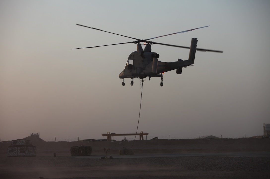 The Kaman K1200 unmanned aerial vehicle hovers over a landing zone at Camp Dwyer while awaiting a load to deliver to Forward Operating Base Payne, June 3. Only two UAVs are used in Afghanistan by Marine Unmanned Aerial Vehicle Squadron 2. This deployment is considered a test run for the UAV platform.