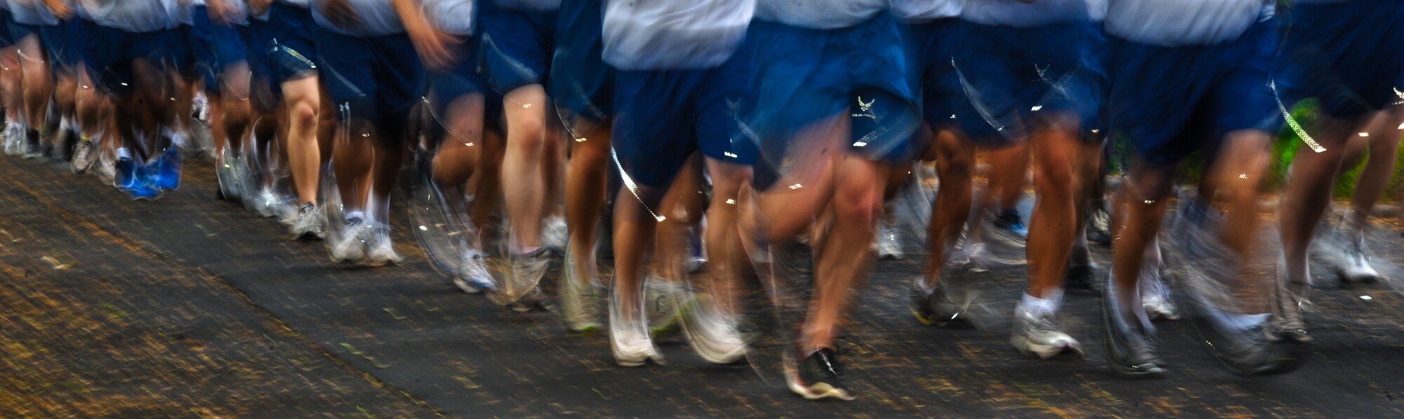Airmen from Joint Base Pearl Harbor-Hickam, Hawaii, participate in the monthly Warrior Run June 1 at Joint Base Pearl Harbor-Hickam, Hawaii. While the Warrior Run takes place monthly, this run marked the final time Barrett and Col. Joe Dague, 15th Wing vice commander, would participate while occupying those positions. (U.S. Air Force photo by Senior Airman Lauren Main)