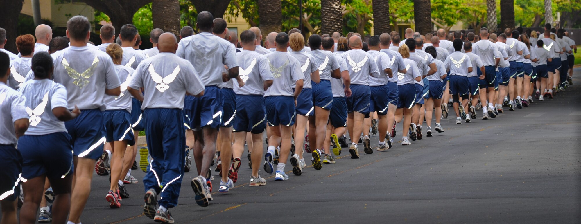 Airmen from Joint Base Pearl Harbor-Hickam, Hawaii, participate in the monthly Warrior Run June 1 at Joint Base Pearl Harbor-Hickam, Hawaii. While the Warrior Run takes place monthly, this run marked the final time Barrett and Col. Joe Dague, 15th Wing vice commander, would participate while occupying those positions. (U.S. Air Force photo by Senior Airman Lauren Main)
