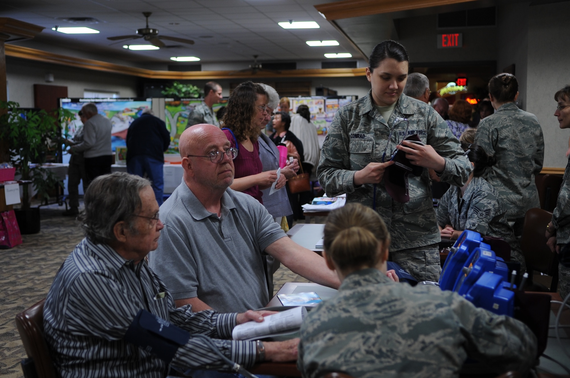 Military retirees have their blood pressure checked by 319th Medical Group technicians during Military Retiree Appreciation Day on June 2, 2012, on Grand Forks Air Force Base, N.D.  (U.S. Air Force photo by Staff Sgt. Amanda Grabiec)
