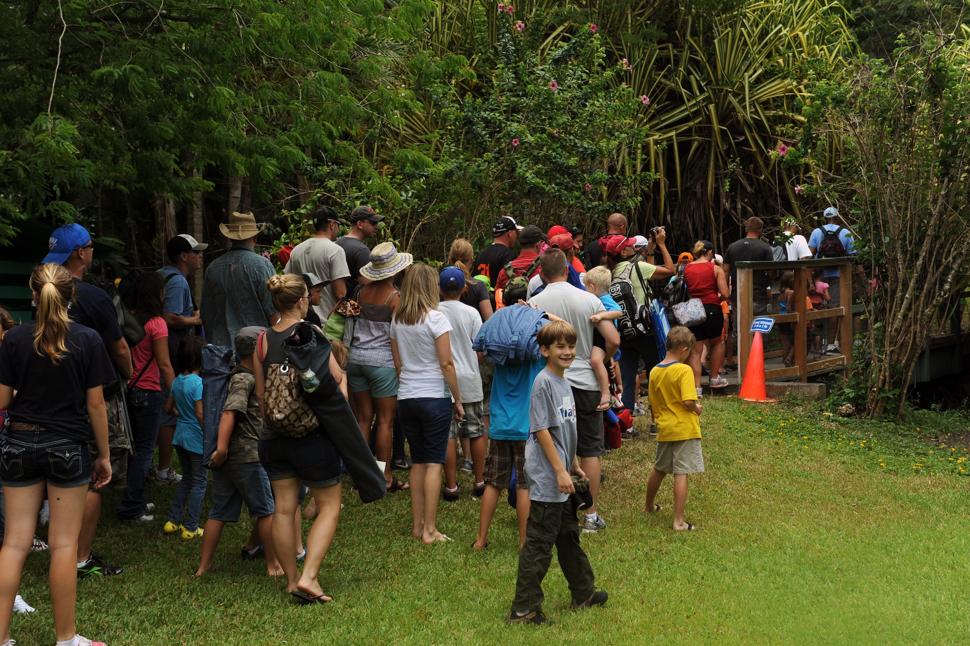 Participants in the 2012 Keiki Fishing Tournament walk to the fish pond May 30 at Ho'omaluhia Botanical Gardens in Kaneohe, Hawaii. The fishing tournament was sponsored by the Friends of Hickam, a group of community leaders who facilitate between the 15th Wing at Joint Base Pearl Harbor-Hickam, Hawaii, and the Hawaii community seeking to support, promote, and foster stronger community relations with those associated with the 15th Wing. (U.S. Air Force photo by Staff Sgt. Nathan Allen)