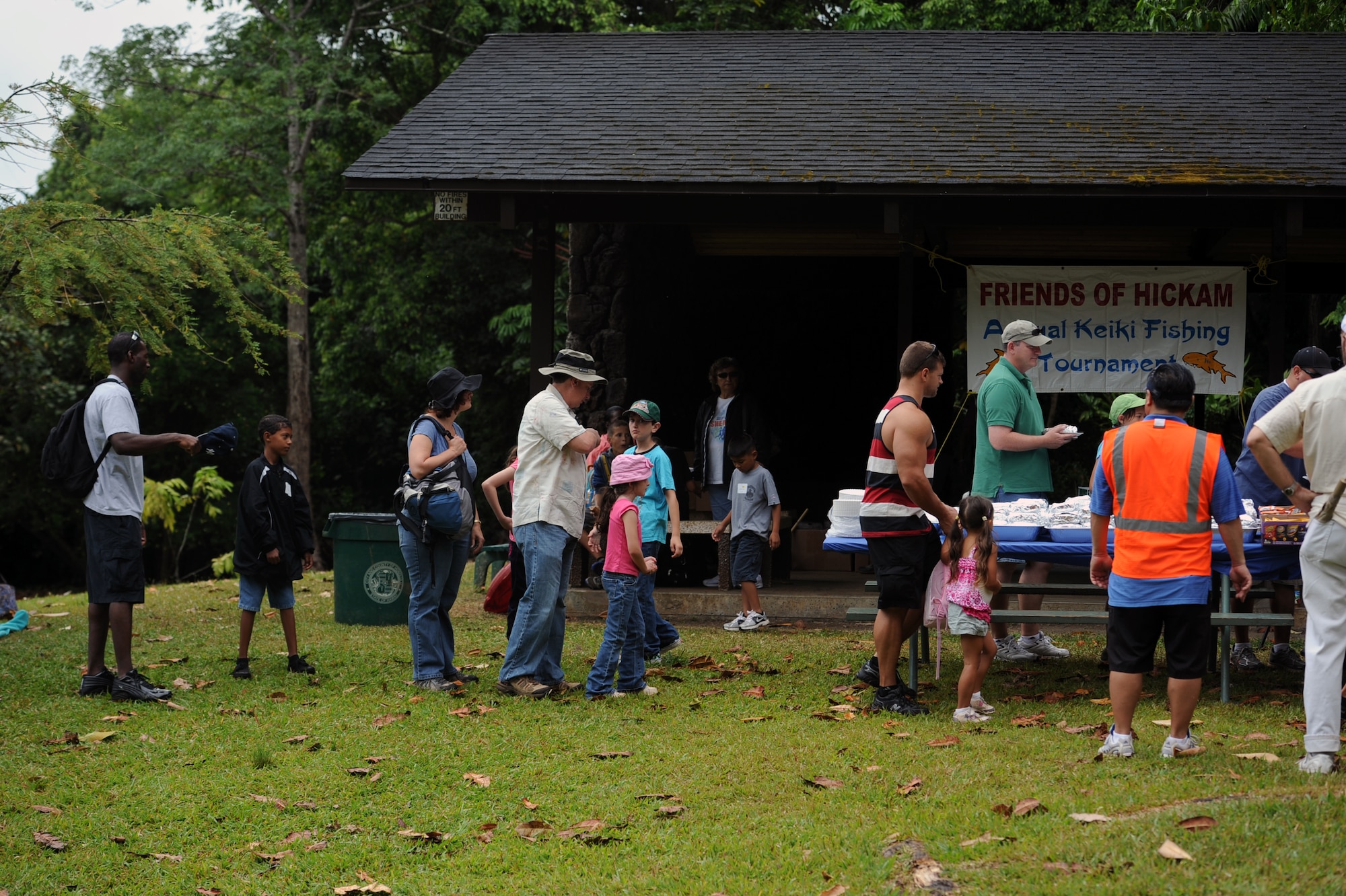 Participants in the 2012 Keiki Fishing Tournament eat lunch May 30 at Ho'omaluhia Botanical Gardens in Kaneohe, Hawaii. The fishing tournament was sponsored by the Friends of Hickam, a group of community leaders who facilitate between the 15th Wing at Joint Base Pearl Harbor-Hickam, Hawaii, and the Hawaii community seeking to support, promote, and foster stronger community relations with those associated with the 15th Wing. (U.S. Air Force photo by Staff Sgt. Nathan Allen)