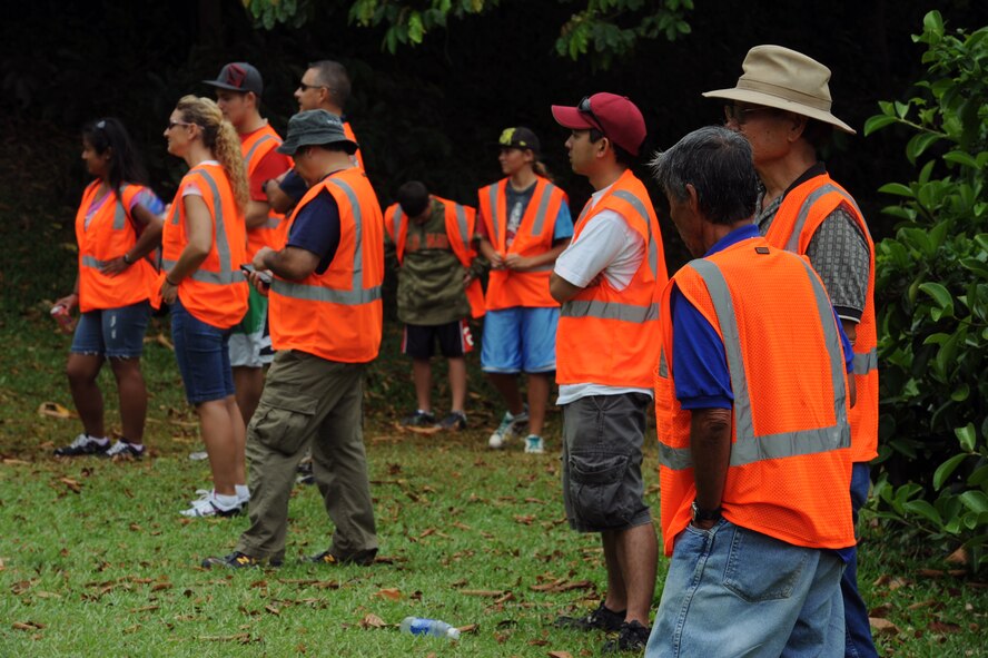 Volunteer Fishing Marshals from Joint Base Pearl Harbor-Hickam, Hawaii, await the commencement of the 2012 Keiki Fishing Tournament May 30 at Ho'omaluhia Botanical Gardens in Kaneohe, Hawaii. The fishing tournament was sponsored by the Friends of Hickam, a group of community leaders who facilitate between the 15th Wing and the Hawaii community seeking to support, promote, and foster stronger community relations with those associated with the 15th Wing. (U.S. Air Force photo by Staff Sgt. Nathan Allen)