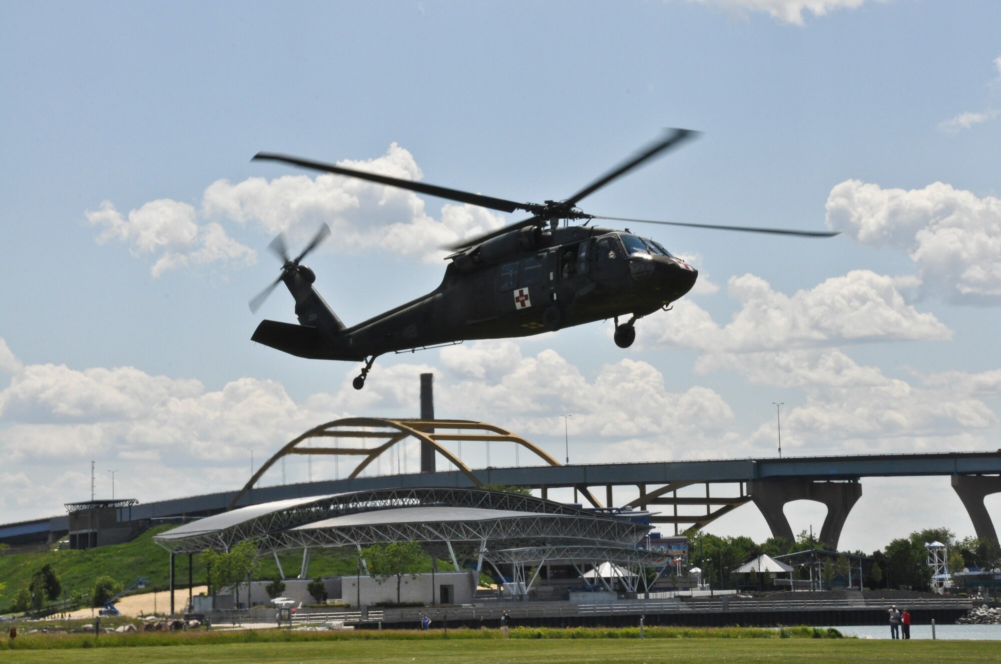 A UH-60 Black Hawk Helicopter from the Army Aviation Supply Facility #1, West Bend, Wis., prepares to land at the training grounds near Lake Michigan, Wis., before conducting water rescue training maneuvers with members of the 128th Air Refueling Wing, Milwaukee on Saturday, June 2, 2012.

The water survival and extraction training was a joint exercise with support from the 128 ARW, UH-60 Black Hawk Helicopters, Coast Guard, and Milwaukee Fire Dept. 

U.S. Air Force Photo by: Staff Sgt. Jeremy M. Wilson
