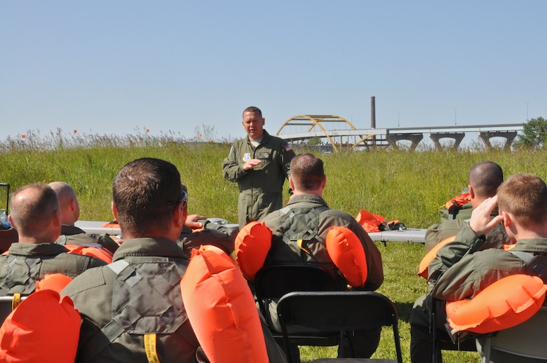 Master Sgt. Adam Becker, Aircrew Flight Equipment, 128th Air Refueling Wing, Milwaukee, conducts a safety briefing for pilots and boom operators before entering Lake Michigan, Wis., for water survival and extraction training on Sat., June 2, 2012. 
The training conducted was a joint exercise with support from the 128 ARW, UH-60 Black Hawk Helicopters from the Army Aviation Support Facility #1, West Bend, Wis., Coast Guard, and Milwaukee Fire Dept. 
U.S. Air Force Photo by: Staff Sgt. Jeremy M. Wilson
