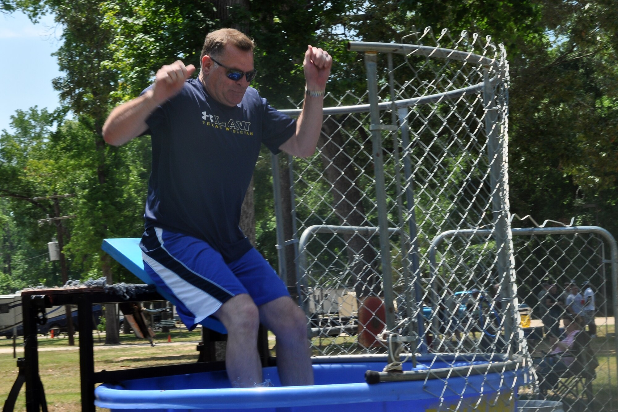 Maj. Leo Kamphaus, the commander of the 307th Maintenance Squadron, takes a swim at the 307th Bomb Wing/917th Fighter Group Family Day at Cullen Park on Barksdale Air Force Base, La., June 2, 2012. The annual event is an opportunity for the Reservists and their families to get together for some fun and camaraderie. (U.S. Air Force photo/Betty Stephens)