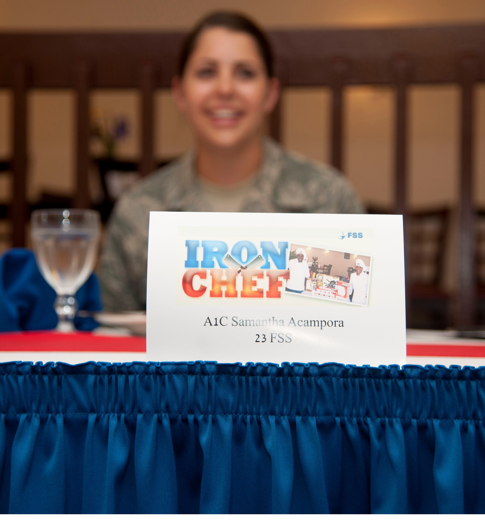U.S. Air Force Airman 1st Class Samantha Acampora, 23d Force Support Squadron, serves as a judge for the second annual Iron Chef Competition at Moody Air Force Base, Ga., May 30, 2012. This was the second annual competition held at Moody, and the event took place at the Georgia Pines Dining Facility.(U.S. Air Force photo by Airman 1st Class Paul Francis/Released)
