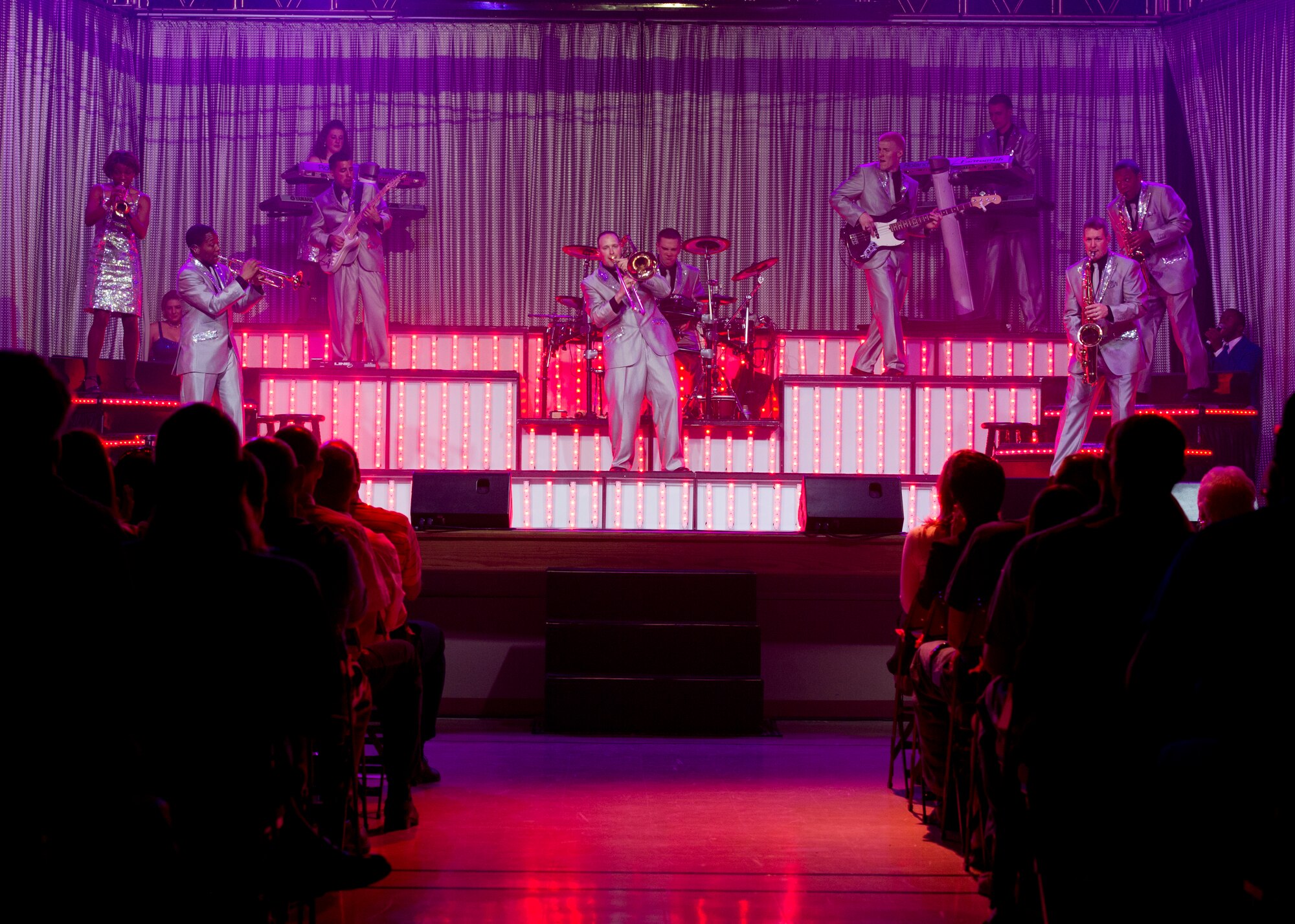 ALAMOGORDO, N.M. – Members of the Tops in Blue ensemble perform at the Tays Center June 1. The 35 members of Tops in Blue serve as an expeditionary entertainment unit to provide quality entertainment for the U.S. Air Force family while simultaneously promoting community relations, supporting recruiting efforts and serving as ambassadors for the U.S. Air Force. The vocalists, musicians, dancers and technicians in the Tops in Blue 2012 tour are scheduled to perform more than 120 shows in 20 different countries this year. Each year, Air Force personnel stationed worldwide compete in a multilevel competition for the right to be selected as a member of the unique unit. The Tops in Blue team is an all active duty Air Force special unit made up of talented performers selected for their entertainment abilities. Since its first world tour in 1953, the group has also performed on film, produced albums, and appeared on national television. This year’s performance featured songs by The Doobie Brothers, Earth, Wind & Fire, Whitney Houston, Maroon 5, Darius Rucker, Carrie Underwood, Lady Antebellum, and The Zac Brown Band. (U.S. Air Force photo by Airman 1st Class Siuta B. Ika/Released)