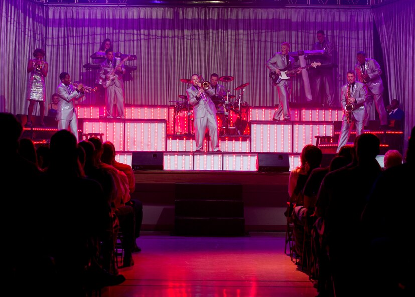 ALAMOGORDO, N.M. – Members of the Tops in Blue ensemble perform at the Tays Center June 1. The 35 members of Tops in Blue serve as an expeditionary entertainment unit to provide quality entertainment for the U.S. Air Force family while simultaneously promoting community relations, supporting recruiting efforts and serving as ambassadors for the U.S. Air Force. The vocalists, musicians, dancers and technicians in the Tops in Blue 2012 tour are scheduled to perform more than 120 shows in 20 different countries this year. Each year, Air Force personnel stationed worldwide compete in a multilevel competition for the right to be selected as a member of the unique unit. The Tops in Blue team is an all active duty Air Force special unit made up of talented performers selected for their entertainment abilities. Since its first world tour in 1953, the group has also performed on film, produced albums, and appeared on national television. This year’s performance featured songs by The Doobie Brothers, Earth, Wind & Fire, Whitney Houston, Maroon 5, Darius Rucker, Carrie Underwood, Lady Antebellum, and The Zac Brown Band. (U.S. Air Force photo by Airman 1st Class Siuta B. Ika/Released)