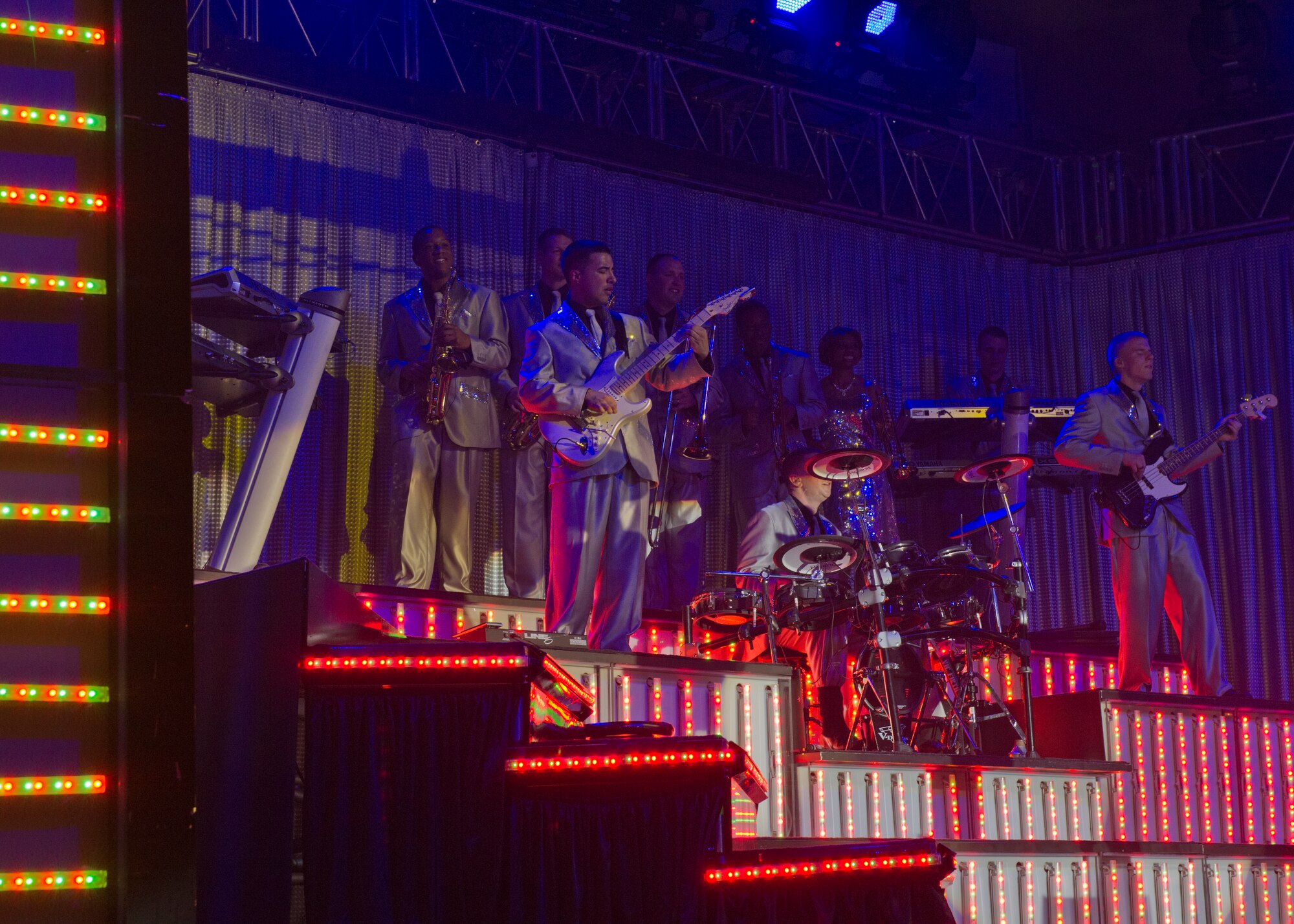 ALAMOGORDO, N.M. – Members of the Tops in Blue ensemble perform at the Tays Center June 1. The 35 members of Tops in Blue serve as an expeditionary entertainment unit to provide quality entertainment for the U.S. Air Force family while simultaneously promoting community relations, supporting recruiting efforts and serving as ambassadors for the U.S. Air Force. The vocalists, musicians, dancers and technicians in the Tops in Blue 2012 tour are scheduled to perform more than 120 shows in 20 different countries this year. Each year, Air Force personnel stationed worldwide compete in a multilevel competition for the opportunity to be selected as a member of the unique unit. The Tops in Blue team is an all active duty Air Force special unit made up of talented performers selected for their entertainment abilities. Since its first world tour in 1953, the group has also performed on film, produced albums, and appeared on national television. This year’s performance featured songs by The Doobie Brothers, Earth, Wind & Fire, Whitney Houston, Maroon 5, Darius Rucker, Carrie Underwood, Lady Antebellum, The Zac Brown Band, as well as a tribute to the late Michael Jackson. (U.S. Air Force photo by Airman 1st Class Siuta B. Ika/Released)