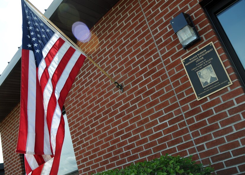 The U.S. flag is displayed on the Walker Warrior Professional Development Center on May 30, 2012, on Grand Forks Air Force Base, N.D.  (U.S. Air Force photo/Airman 1st Class Ashley N. Taylor) 