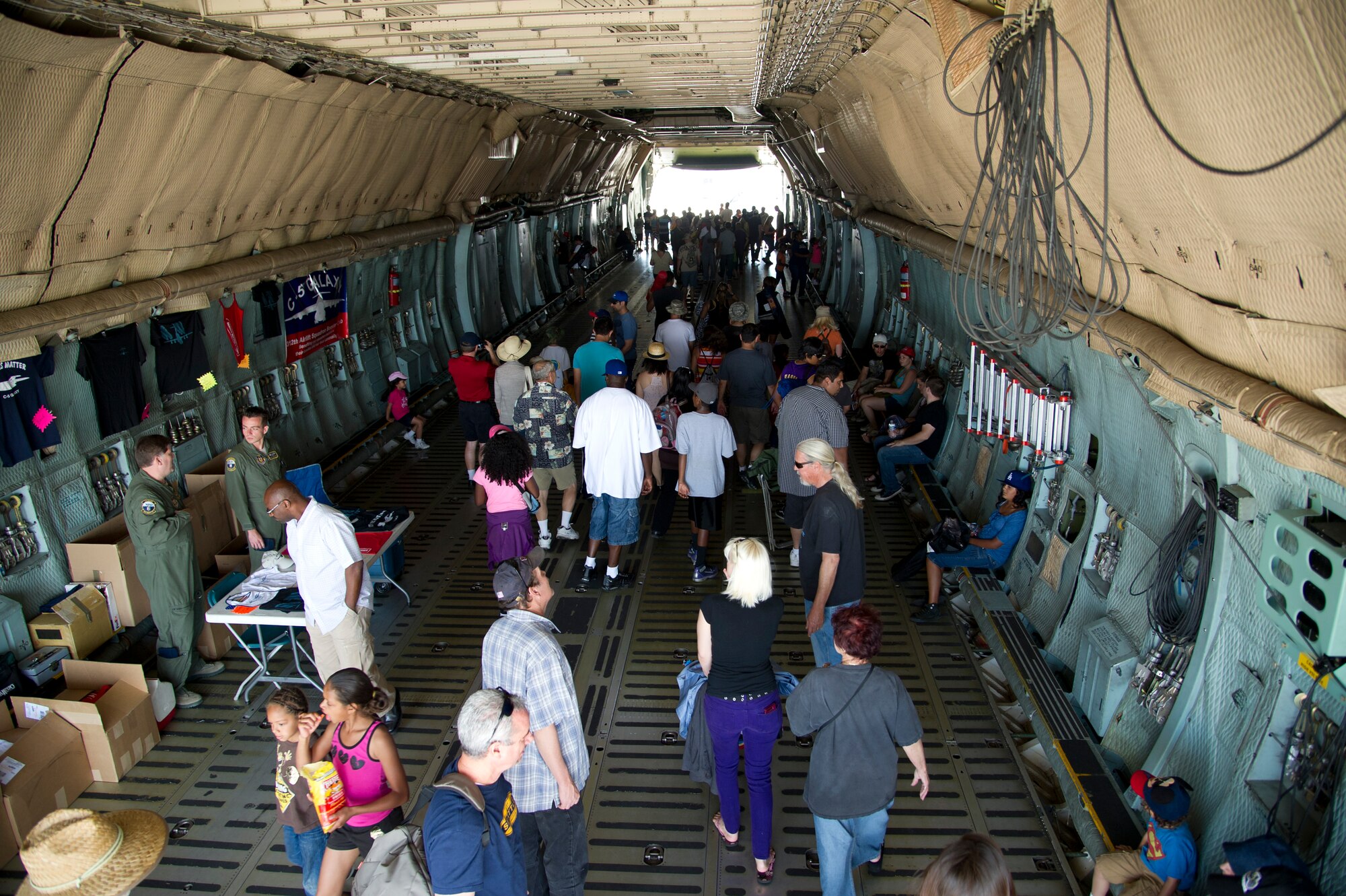 Spectators walk though a C-5 Galaxy during AirFest 2012. (U.S. Air Force photo by Staff Sgt. Matthew Smith)