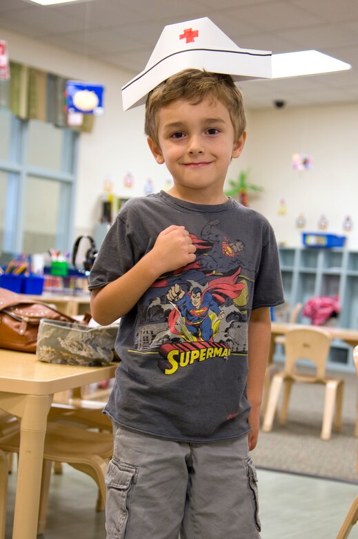 Dominic Stanusic, a pre-kindergarten student, poses with the nurse’s cap he created at Child Development Center East at Hurlburt Field, Fla., May 10, 2012. Nurses and medical technicians from Hurlburt Field’s clinic marked Nurse and Tech Week by sharing their passion for their career fields with young children. (U.S. Air Force photo / Airman 1st Class Michelle Vickers) (RELEASED) 
