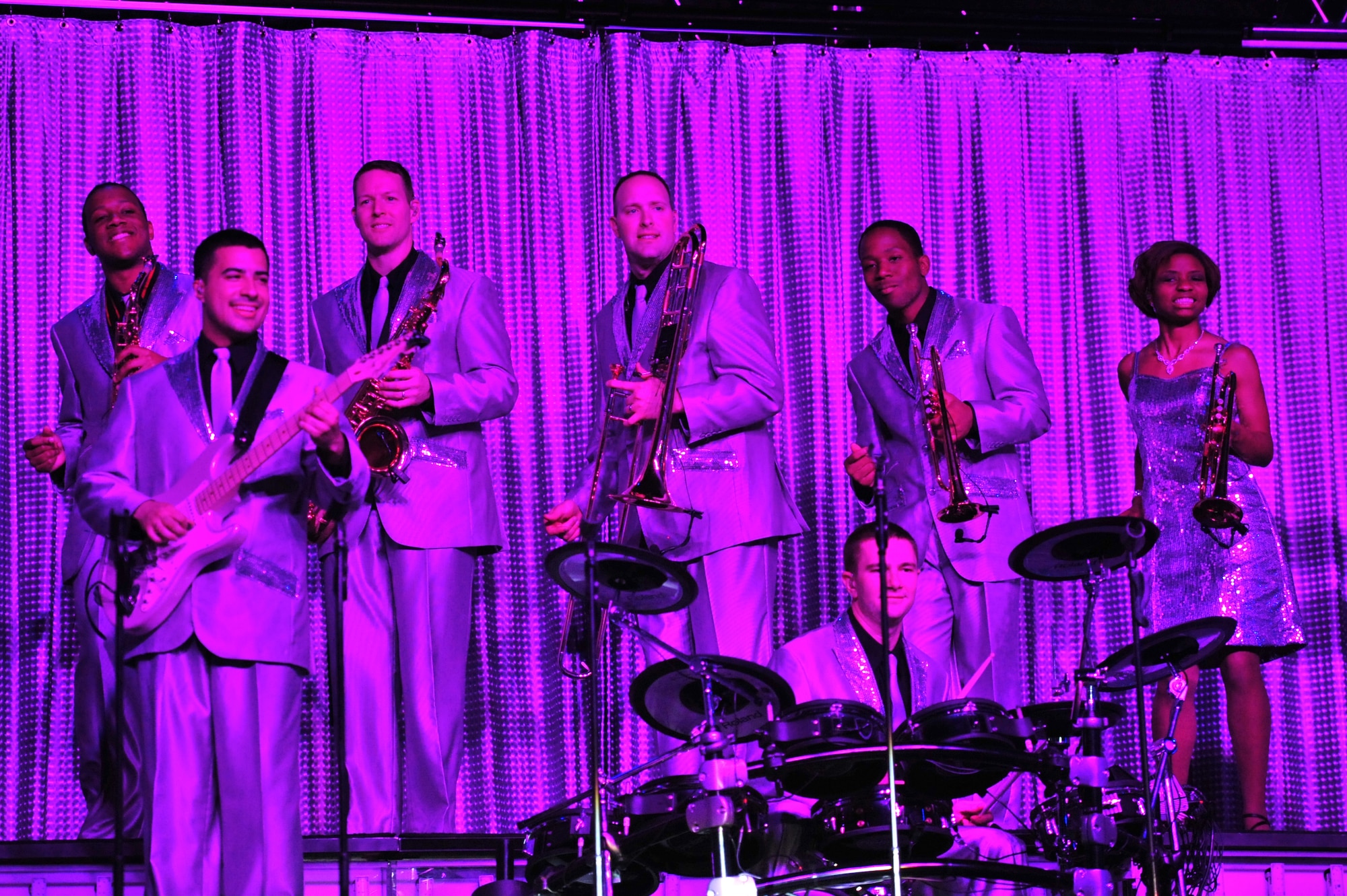 The U.S. Air Force Tops in Blue band provides back up music instrumentals for vocalists at their first live performance held at Marshall Auditorium, Clovis, N.M., May 28, 2012. The ensemble provides quality entertainment utilizing talented Airmen from every rank within the force. (U.S. Air Force photo by Airman 1st Class Alexxis Pons Abascal)  