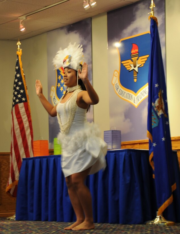 Members of the Wichita Falls Hula Polynesian Dance Troupe perform at the Asian Pacific American Heritage Luncheon held at the Sheppard Club on May 31. Attendees got to see three styles of dance and hear from guest speaker Col. Om Prakash, 82nd Training Wing Vice Wing Commander. (U.S. Air Force Photo/Kimberly Dagdag)