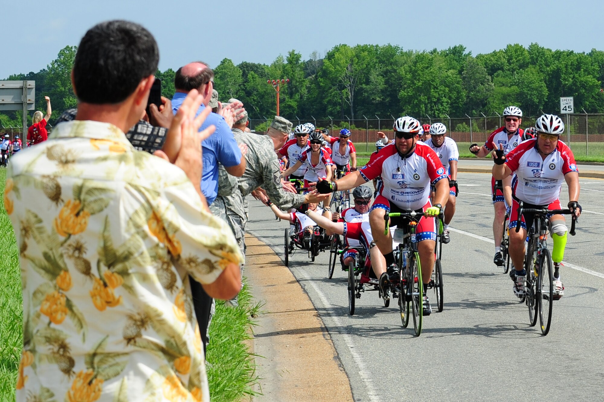 Ride 2 Recovery Memorial Challenge participants pass by Langley Air Force Base, Va., June 1, 2012.  The program is designated a difference in the lives of veterans by assisting their mental and physical rehabilitation programs.  (U.S. Air Force photo by Airman 1st Kayla Newman/Released) 