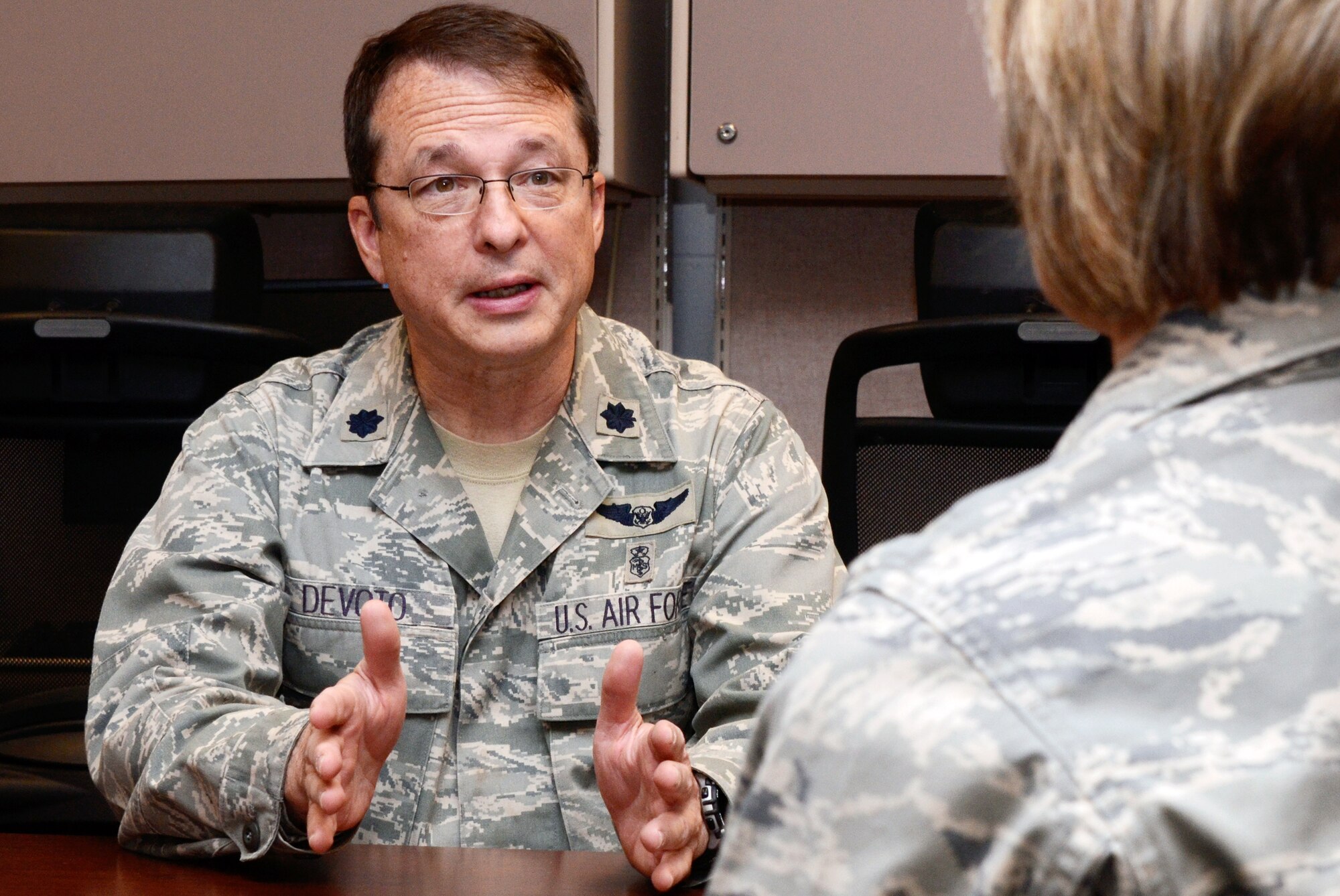 120524-F-UG926-001 – Lt. Col. Kim Devoto, a Medical Service Corp. officer from the Office of the Surgeon General, Pentagon, and the first Individual Reservist to return through the Centralized Deployment Processing Center, Dobbins Air Reserve Base, Ga., briefs welcoming members on his deployment experiences May 24. (U.S. Air Force photo/Don Peek)