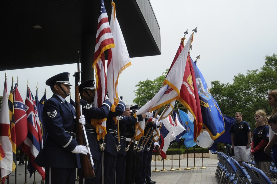 The Misawa Air Base Honor Guard presents the colors at the opening ceremony of the 24th Annual American Day at Misawa City, Japan, June 3, 2012. Proper courtesies were displayed for both the Japanese and United States national anthems. The festival was held in an attempt to support strengthening bilateral relations. More than 80,000 people attended the festival. (U.S. Air Force photo by Airman 1st Class Zachary Kee/Released)