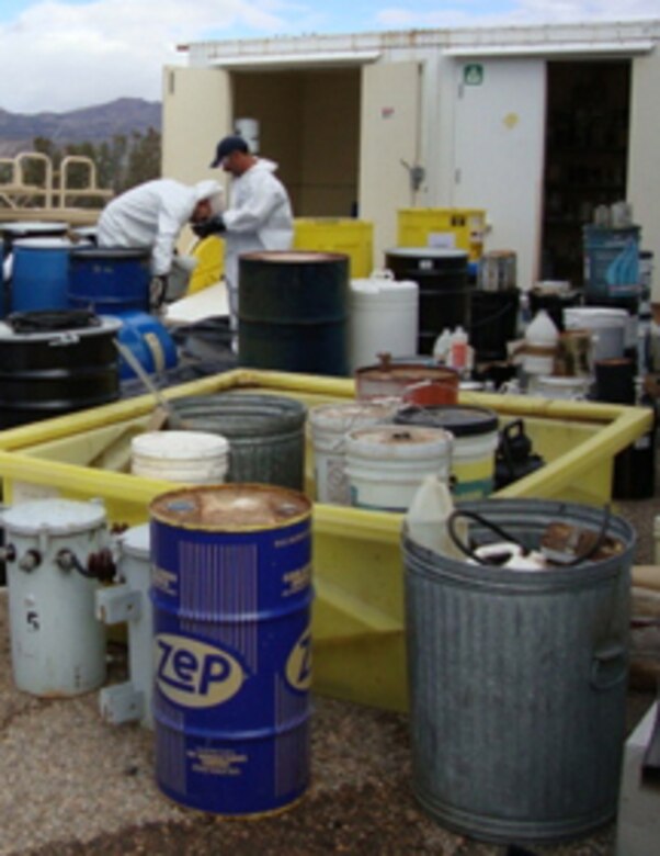 Contractors from Advanced Environmental Solutions, Inc. of Belen, N.M., wore personal protective equipment and performed the actual clean up at the Cochiti project.