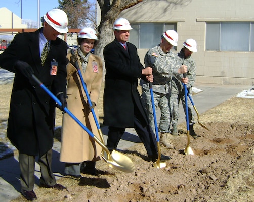 Congressman Martin Heinrich (middle), a representative from Senator Jeff Bingaman’s office, Deputy Space Development & Test Directorate Deputy Commander Colonel Carol Welsch, Deputy Corps Commander Major Richard Collins and Honorary Space Development and Test Directorate Commander Mr. Dave Seely (President, Kirtland Federal Credit Union) participate in the ground-breaking ceremony at Kirtland AFB.