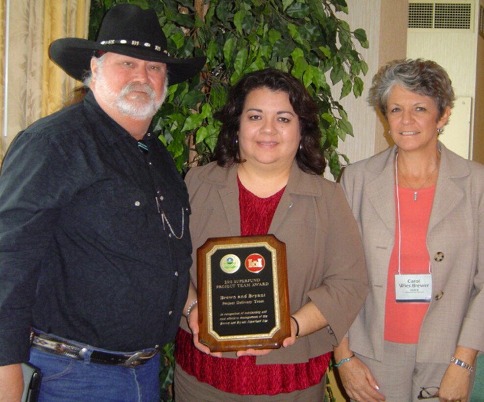 Accepting the award for the team was Rick Lainhart from the Los Angeles District, Cecilia Horner (middle) and Carol Wies-Brewer, both from the Albuquerque District.