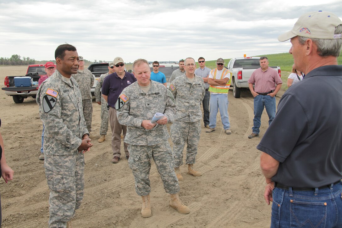 Lt. Gen. Thomas P. Bostick, Chief of Engineers, Col. Robert Ruch, Omaha District Commander and Col. Robert Tipton, Northwestern Division Deputy Commander, met with levee sponsors May 25 near Missouri River Levee L-575 in the vicinity of Hamburg, Iowa, which was impacted by the 2011 Missouri River Flood and was the scene of critical repair work completed by the Omaha District this spring.