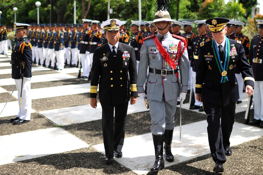 U.S. Army Gen. Martin E. Dempsey, chairman of the Joint Chiefs of Staff, completes his review of the Filipino Honor Guard on Camp Aguinaldo, Philippines, June 4, 2012.