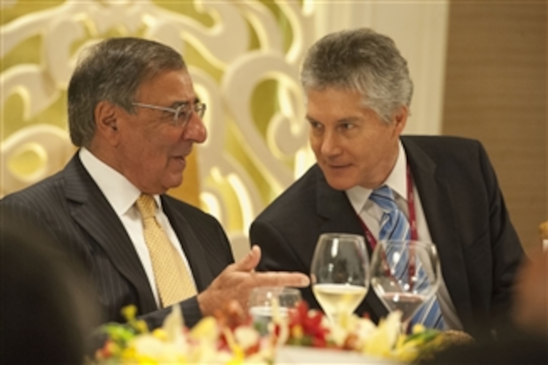 Secretary of Defense Leon E. Panetta talks with Australian Minister of Defense Stephen Smith during lunch at the Shangri-La Dialogue in Singapore, on June 2, 2012. Panetta will also hold a series of bilateral and trilateral meetings with Asian allies during the Shangri-La Dialogue.  The conference is part of Panetta's ten-day trip to the Asia-Pacific to meet with defense counterparts.  