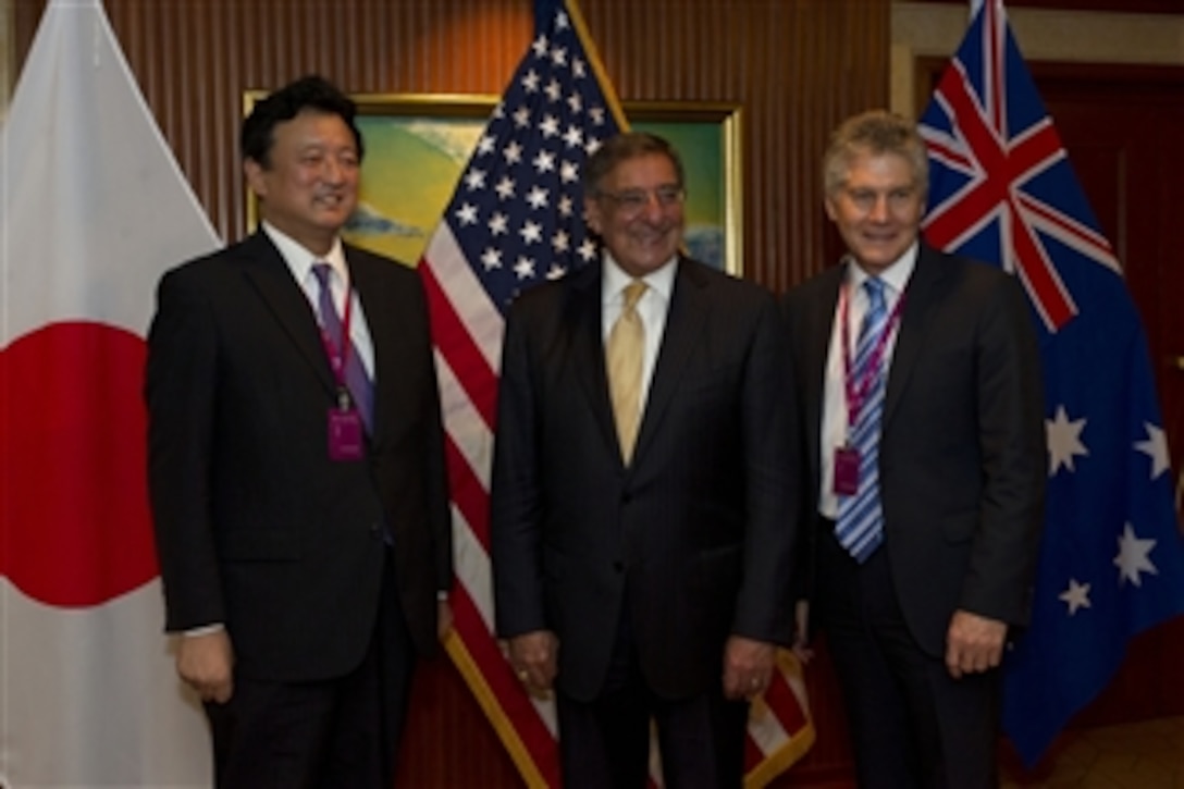 Japanese Senior Vice Minister of Defense Watanabe Shu, Secretary of Defense Leon E. Panetta and Australian Minister of Defense Stephen Smith pose for photographers at the Shangri-La Dialogue in Singapore on June 2, 2012.  Panetta will also hold a series of bilateral and trilateral meetings with Asian allies during the Shangri-La Dialogue.  The conference is part of Panetta's ten-day trip to the Asia-Pacific to meet with defense counterparts.  