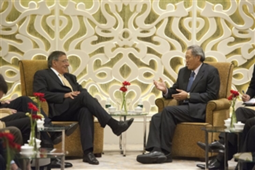 Secretary of Defense Leon E. Panetta meets with Singapore's Minister of Defense Ng Eng Hen, at the Shangri-La Dialogue in Singapore on June 2, 2012.  Panetta is attending the Shangri-La Dialogue and will also hold a series of bilateral and trilateral meetings with Asian allies while there.  The conference is part of Panetta's ten-day trip to the Asia-Pacific to meet with defense counterparts.  