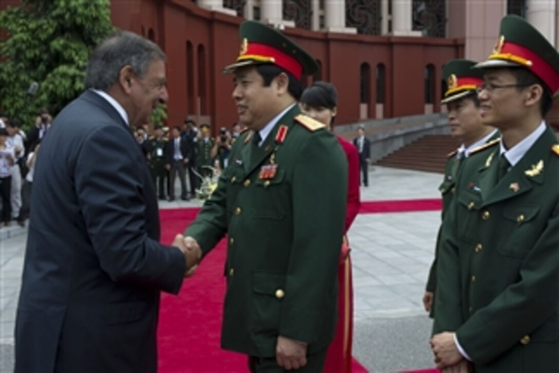 Secretary of Defense Leon E. Panetta shakes hands with Vietnamese Minister of National Defense Senior Lt. Gen. Phuong Quang Thanh in Hanoi, Vietnam, on June 4, 2012.  Panetta is on ten-day trip to the Asia-Pacific to meet with defense counterparts.  