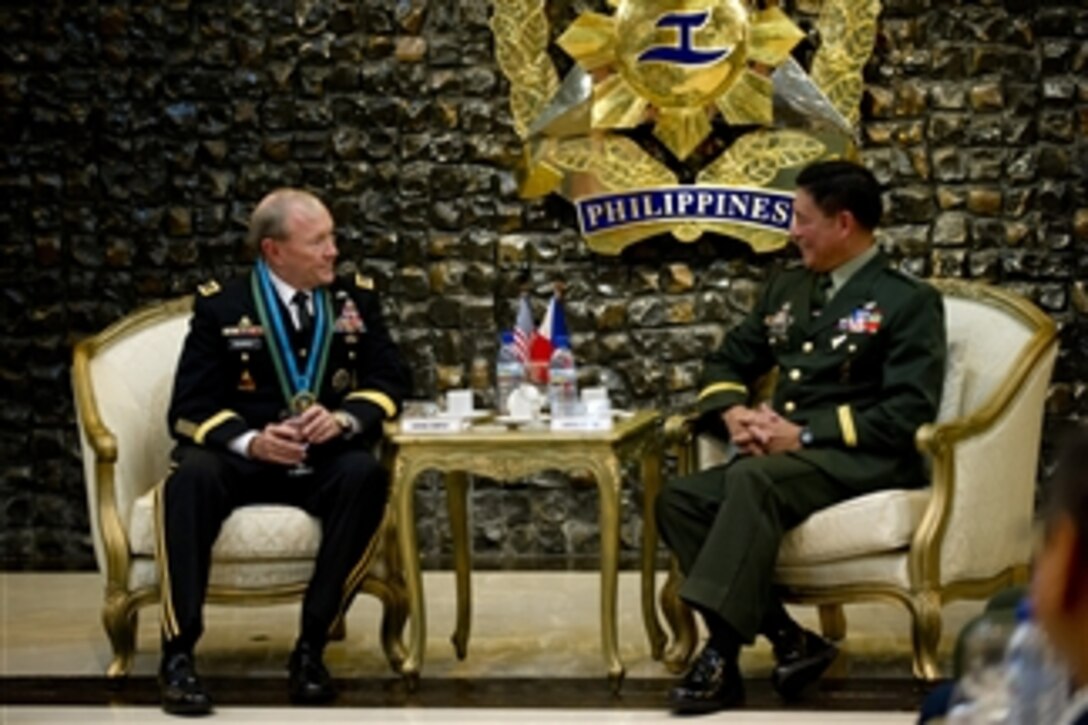 Chief of Staff Armed Forces of the Philippines Lt. Gen. Jessie Dellosa (right) and Chairman of the Joint Chiefs of Staff Gen. Martin E. Dempsey meet at Camp Aguinaldo, Philippines, on June 4, 2012